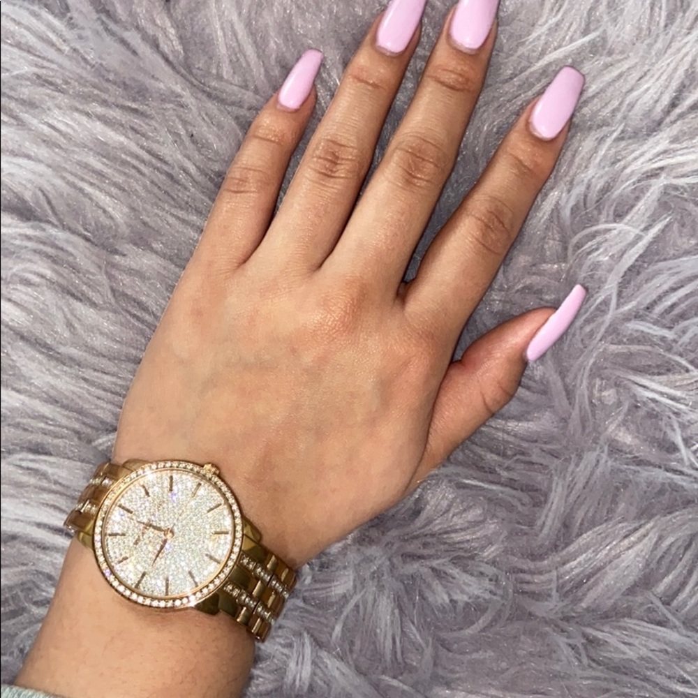 rose gold Michael Korda women’s watch